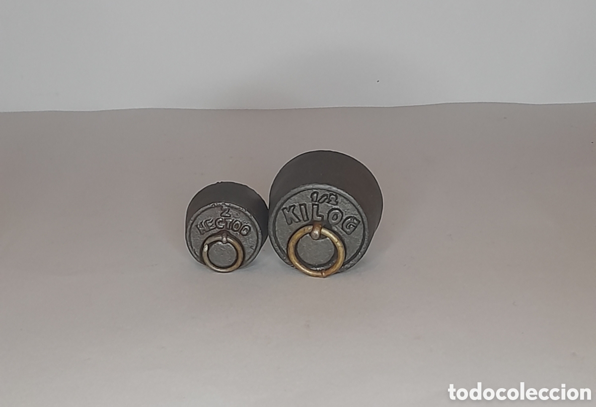 Antig&uuml;edades: Juego de dos pesas antiguas. - Foto 1