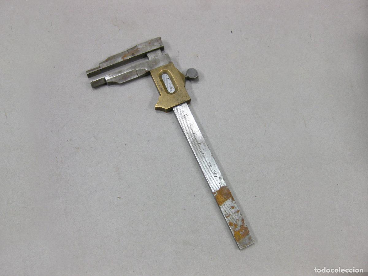 Antig&uuml;edades: CALIBRE ANTIGUO DE HIERRO Y LAT&Oacute;N - Foto 1