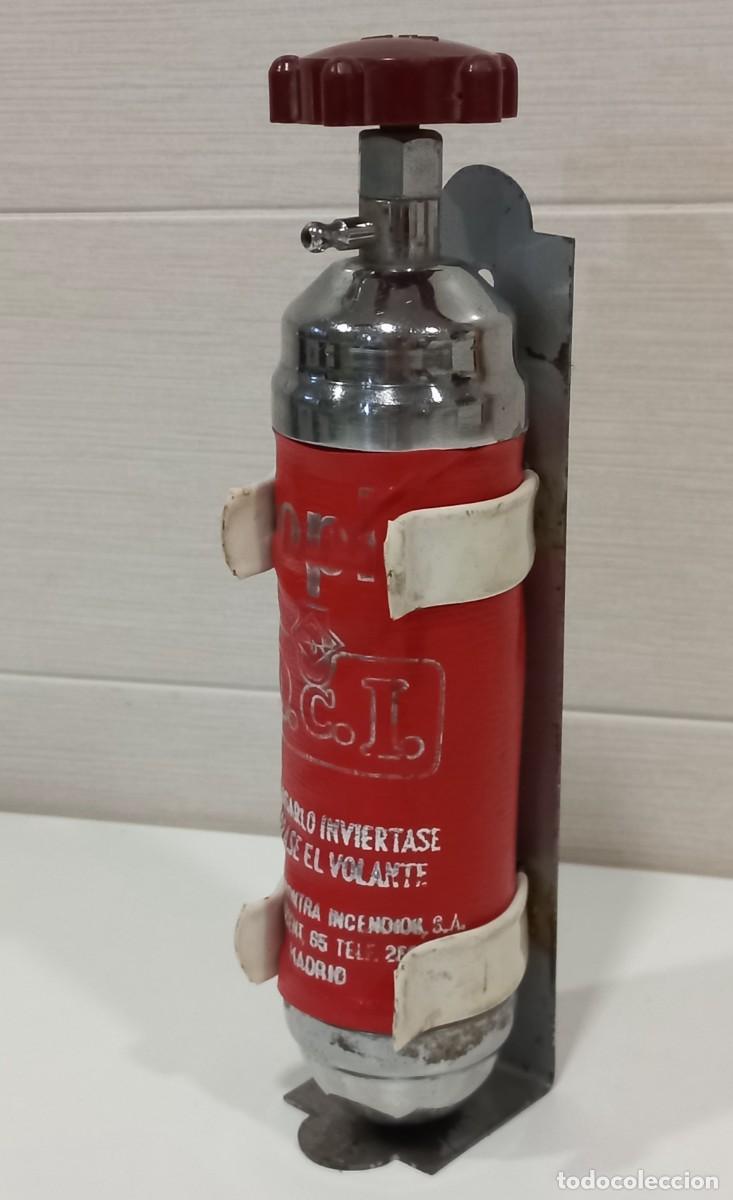Antig&uuml;edades: MINI EXTINTOR CON SOPORTE Y RUEDA DE BAQUELITA - SOPIO - Foto 1