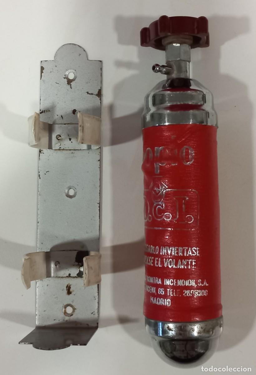 Antig&uuml;edades: MINI EXTINTOR CON SOPORTE Y RUEDA DE BAQUELITA - SOPIO - Foto 2