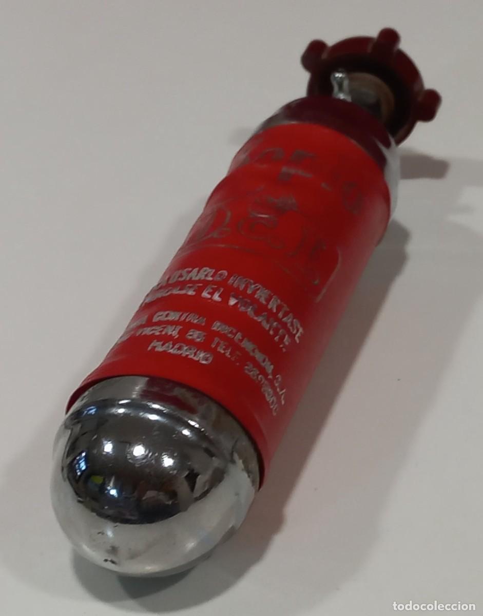 Antig&uuml;edades: MINI EXTINTOR CON SOPORTE Y RUEDA DE BAQUELITA - SOPIO - Foto 5