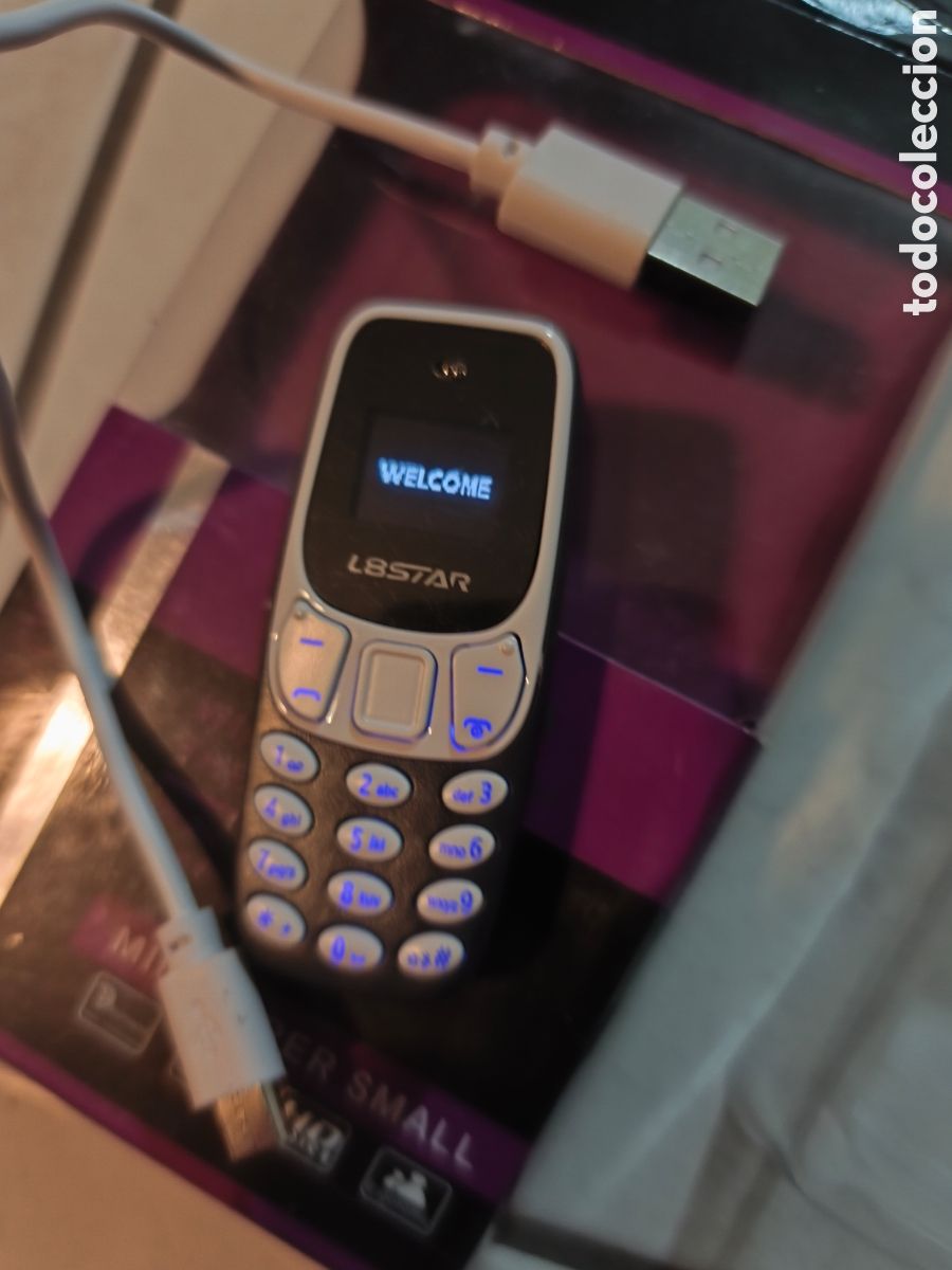 Telefone: Mini-T&eacute;l&eacute;phone Portable Neuf 100%Plastique Couleur Gris,Jamais Servi