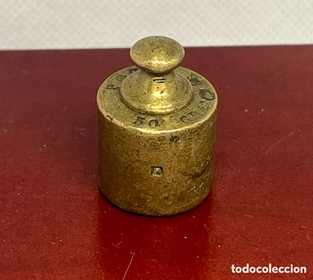 Antig&uuml;edades: Pesa de bronce de 50 gramos - Foto 1