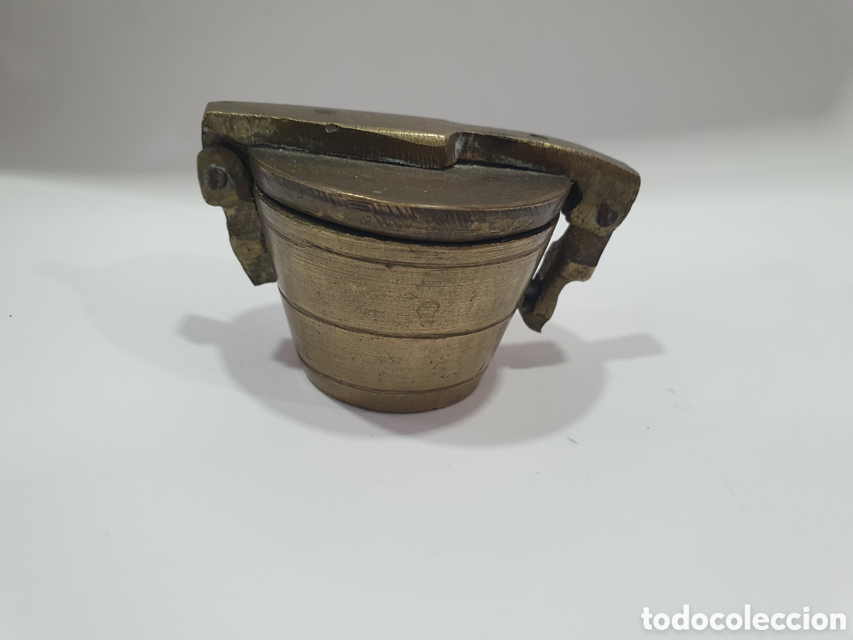 Antiguidades: Juego de ponderales de bronce. (L61)