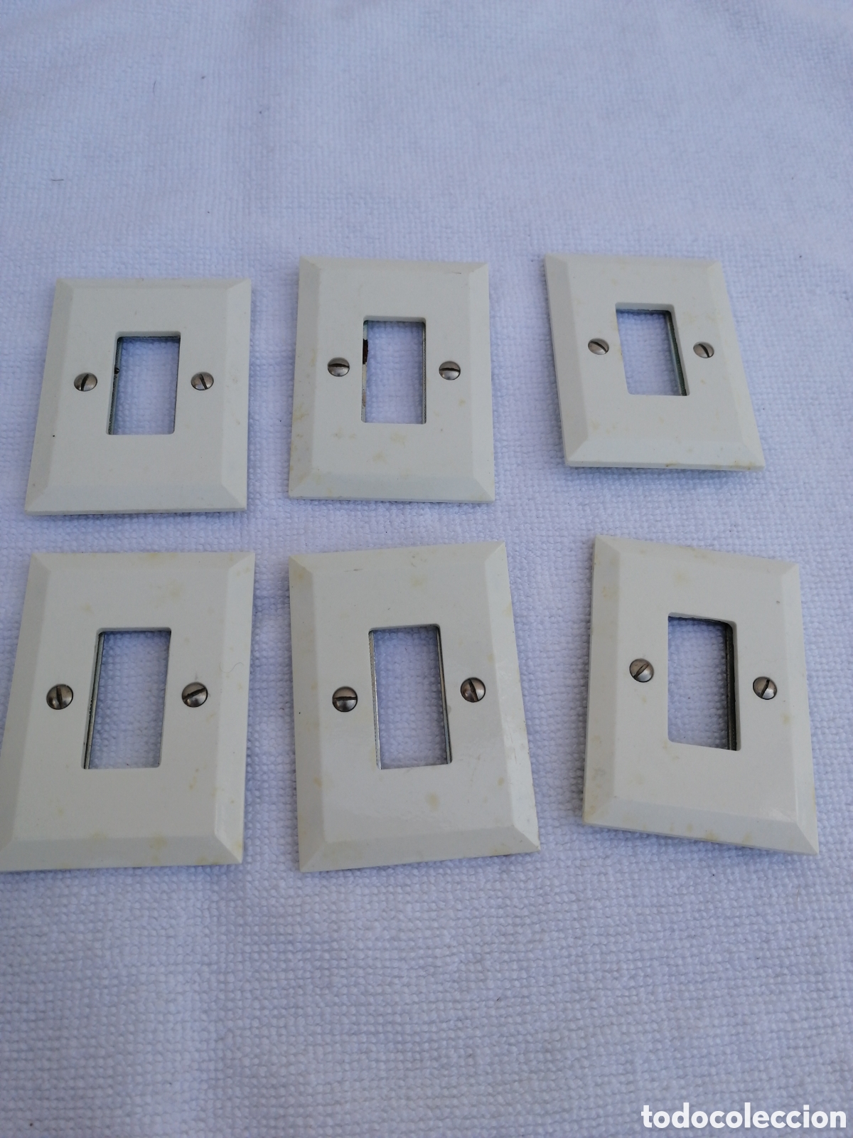 Antig&uuml;edades: Lote Placa embellecedor para interruptor
