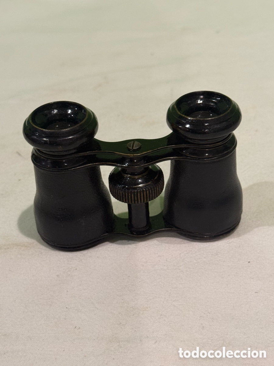 Antig&uuml;edades: Antiguos prism&aacute;ticos de teatro piel negra mediados del siglo XX binoculares vintage compactos