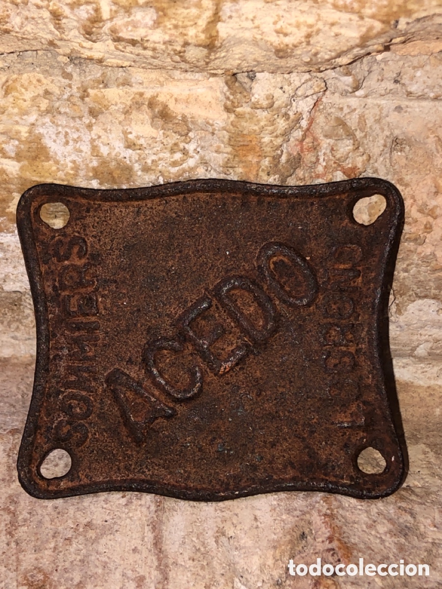 Antig&uuml;edades: Chapa hierro logotipo