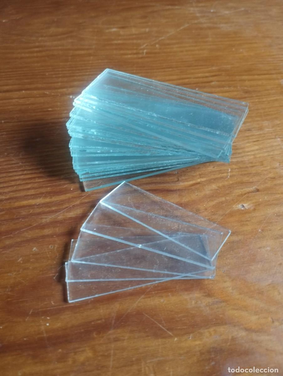Antig&uuml;edades: 24 portaobjetos de microscopio. Son l&aacute;minas delgadas de vidrio que se utilizan para colocar muestras