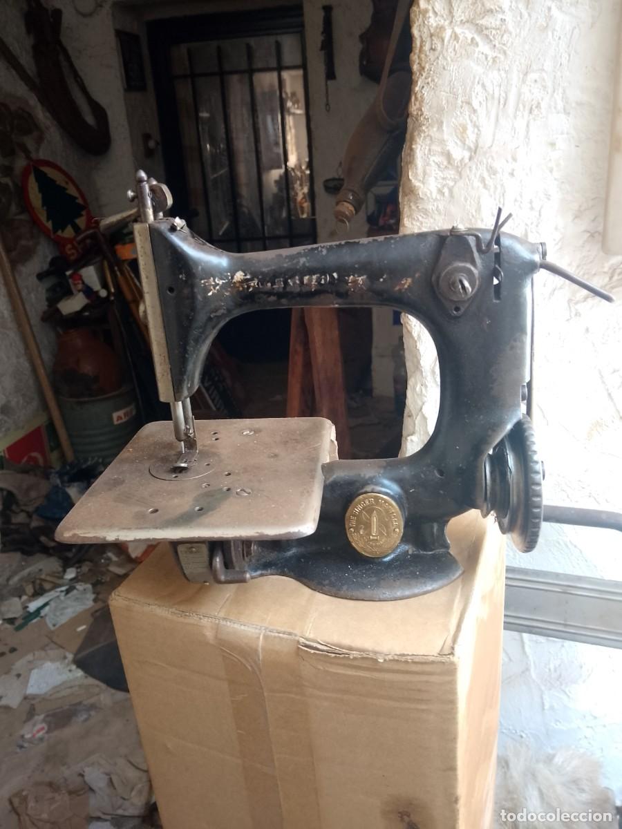 Antiguidades: Antigua m&aacute;quina de coser singer