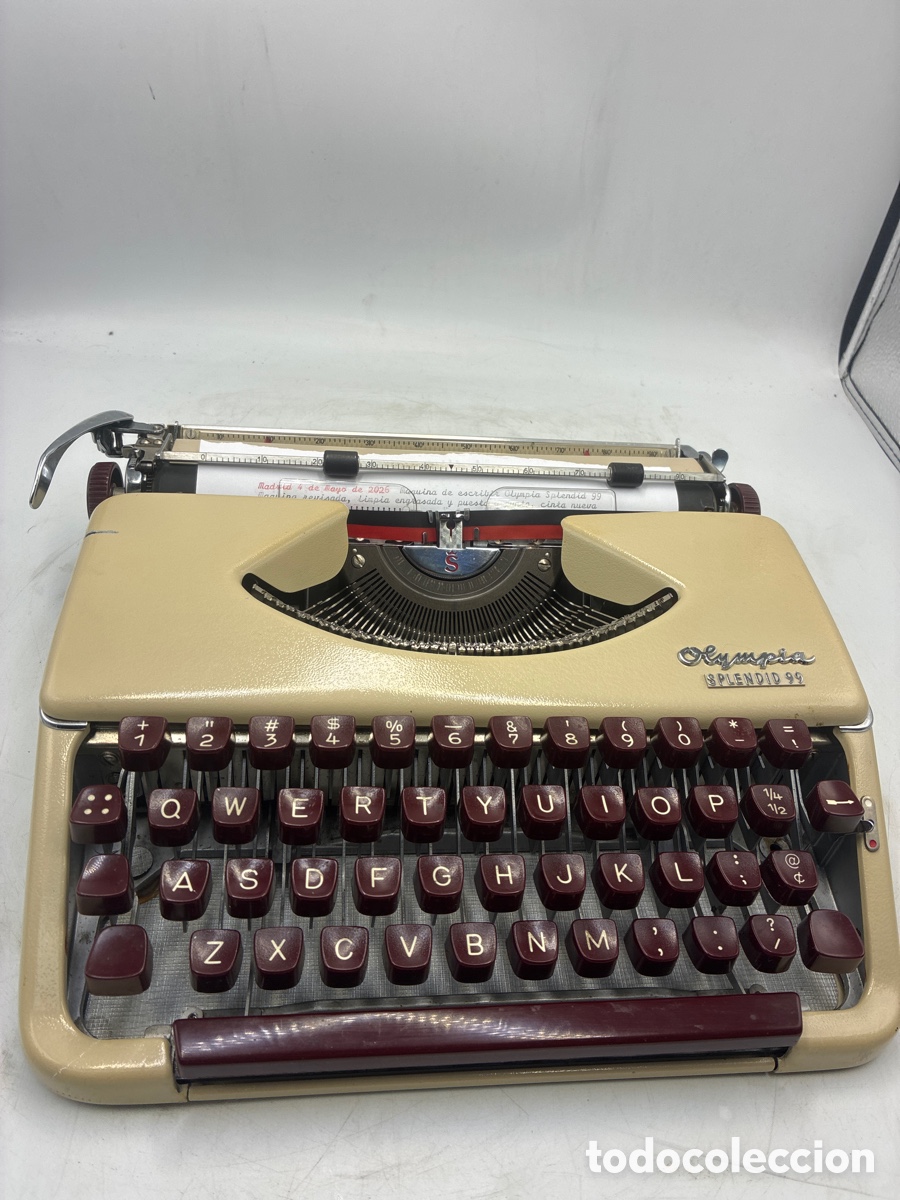 Antig&uuml;edades: M&aacute;quina de Escribir Olympia Splendid 99 escritura cursiva.