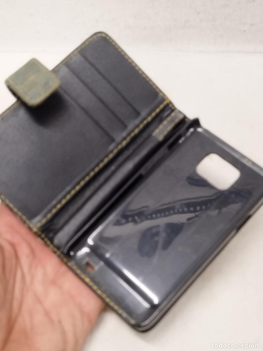 Tel&eacute;fonos: Funda para tel&eacute;fono m&oacute;vil, a identificar. - Foto 2