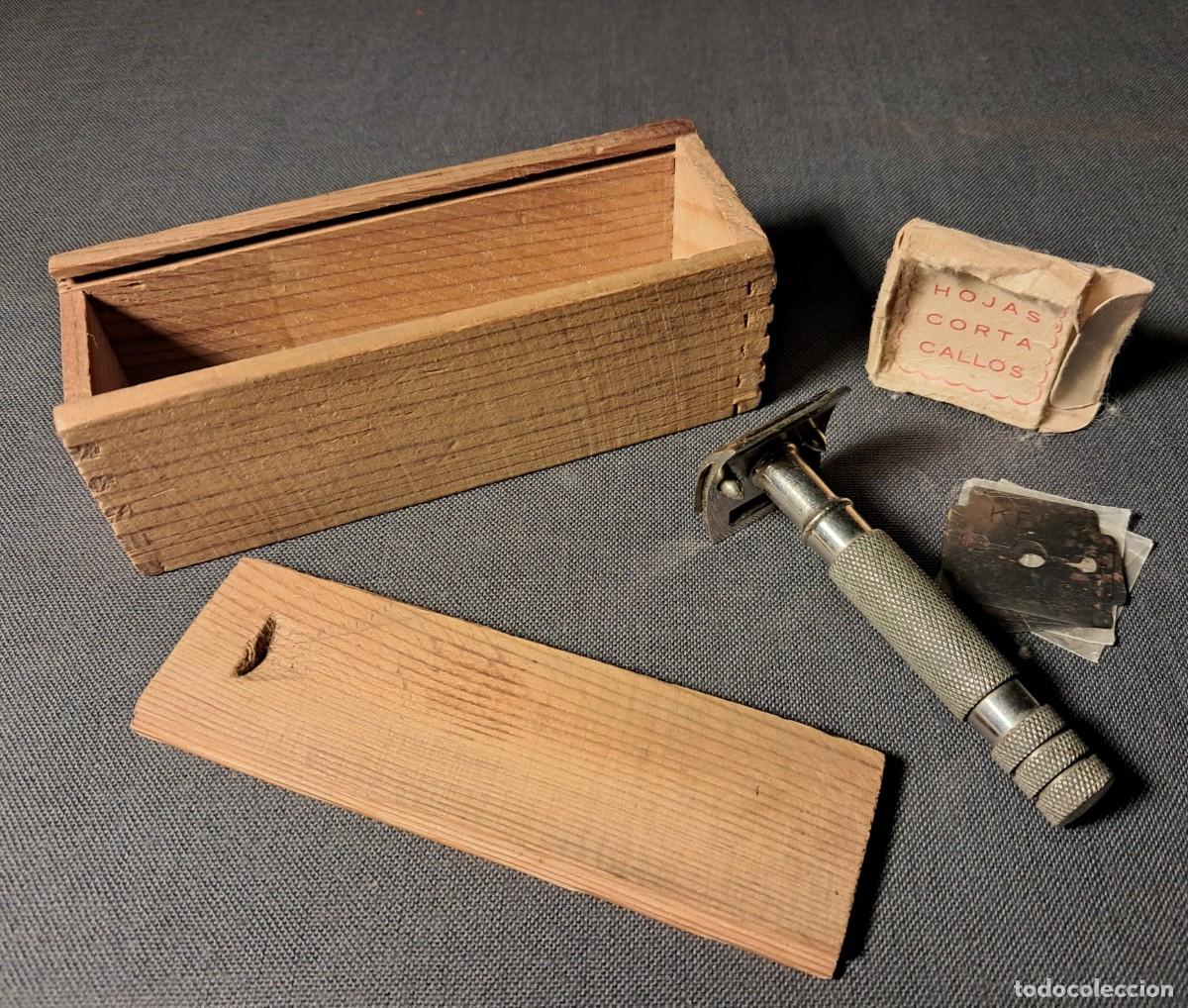 Antig&uuml;edades: CORTACALLOS CON ESTUCHE Y HOJAS
