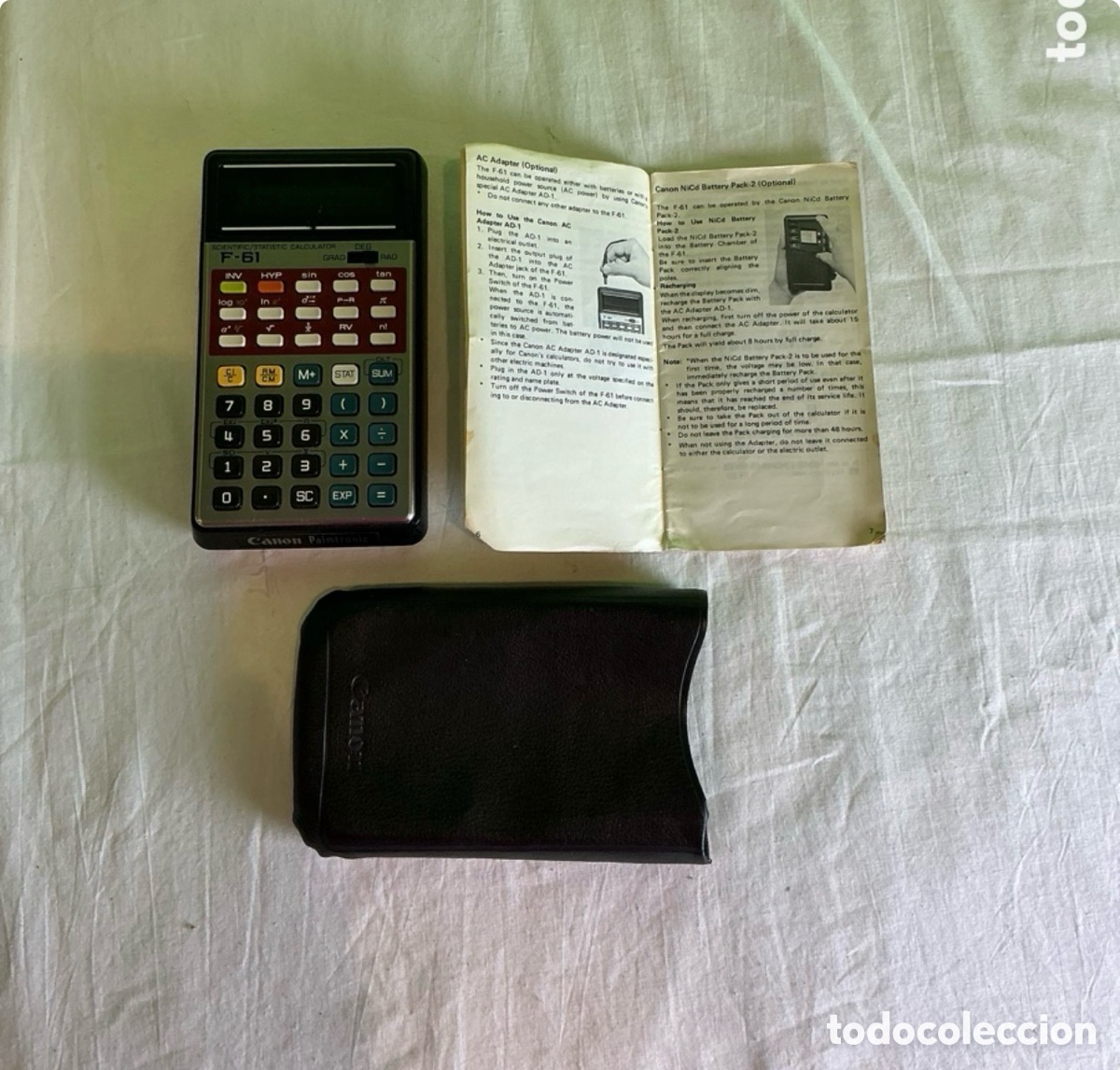 Antig&uuml;edades: Calculadora cient&iacute;fica vintage Canon Palmtronic F-61 con funda y manual original