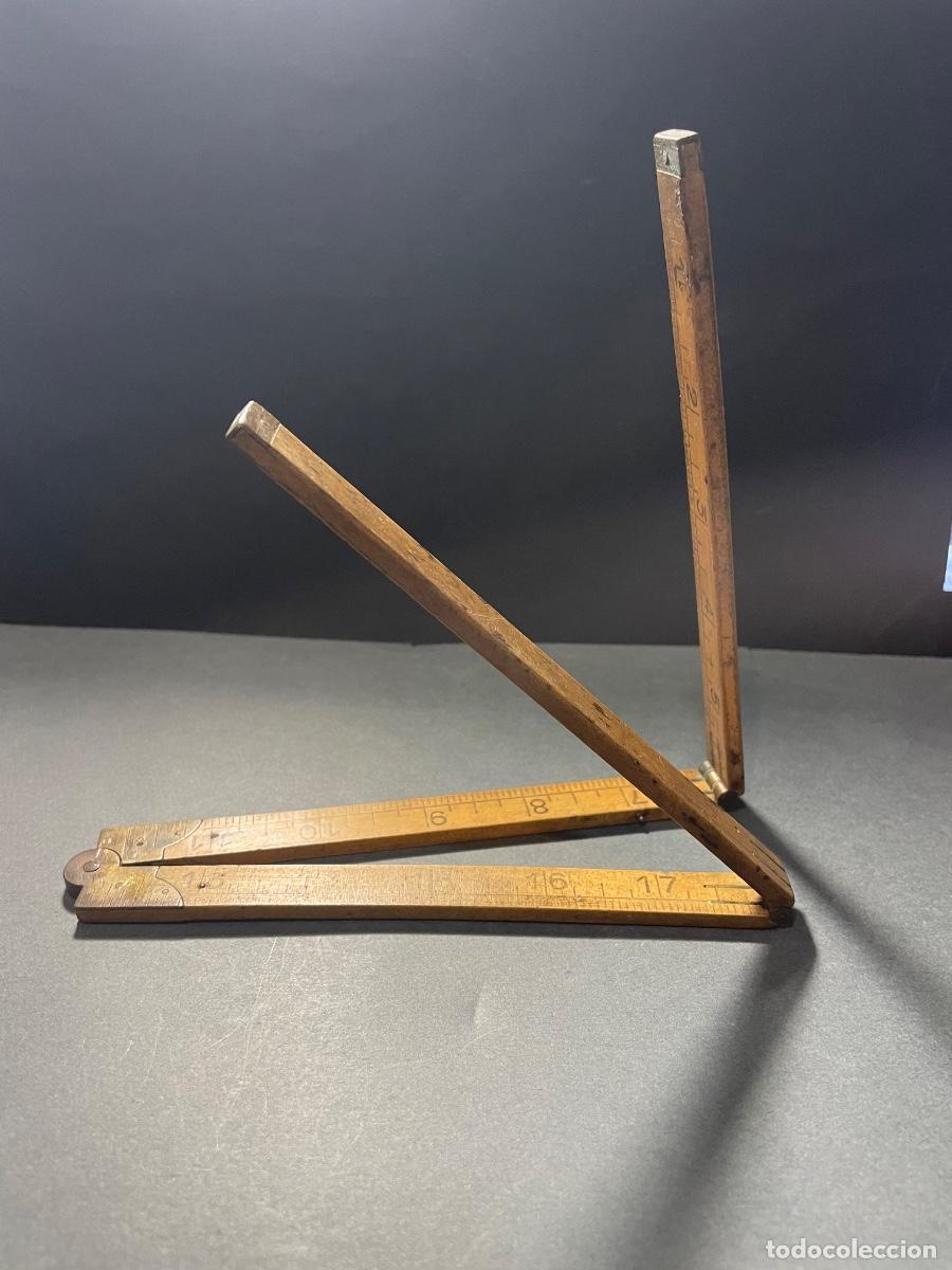 Antig&uuml;edades: ANTIGUO METRO INGLES MADERA Y BRONCE PLEGABLE - CERRADO 16X2,5 CM. ABIERTO 61X1,8 CM.