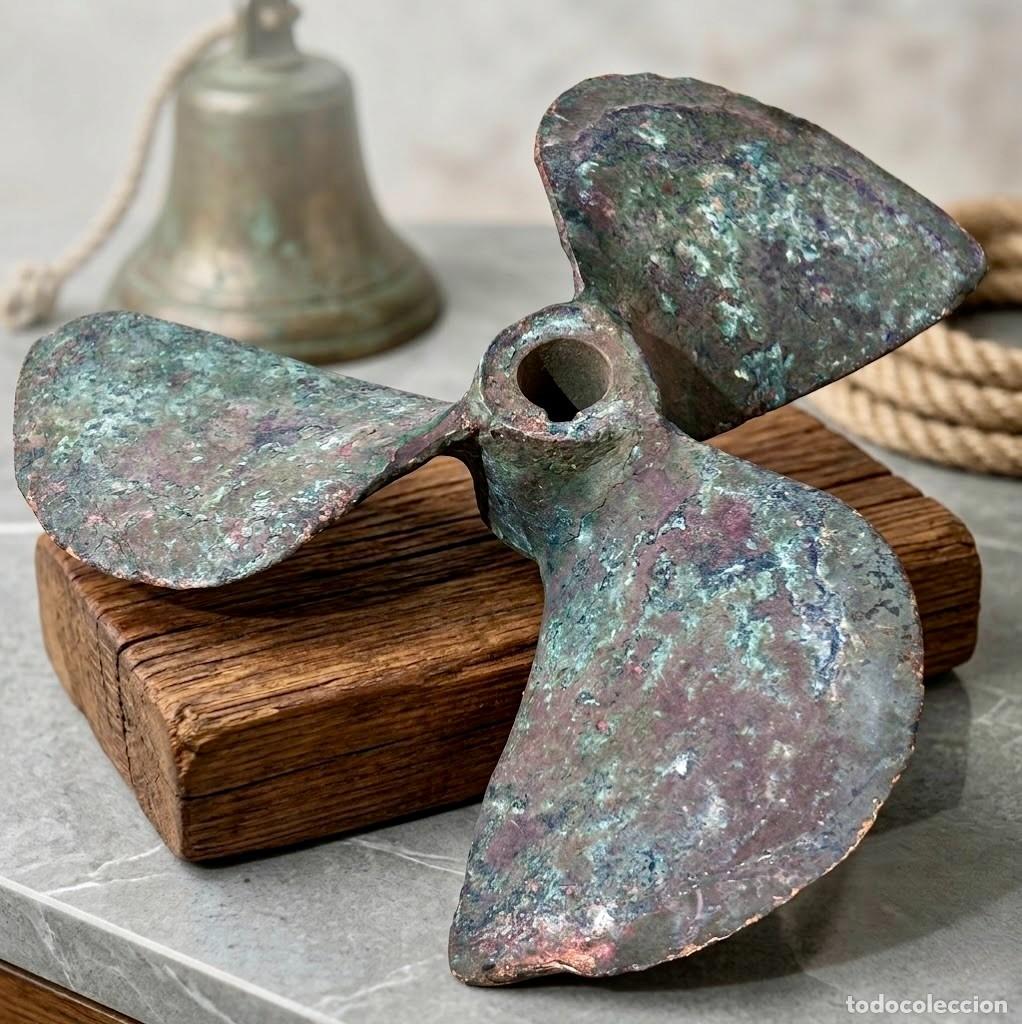 Antig&uuml;edades: H&eacute;lice n&aacute;utica antigua. Bronce. 24&times;6 cm.