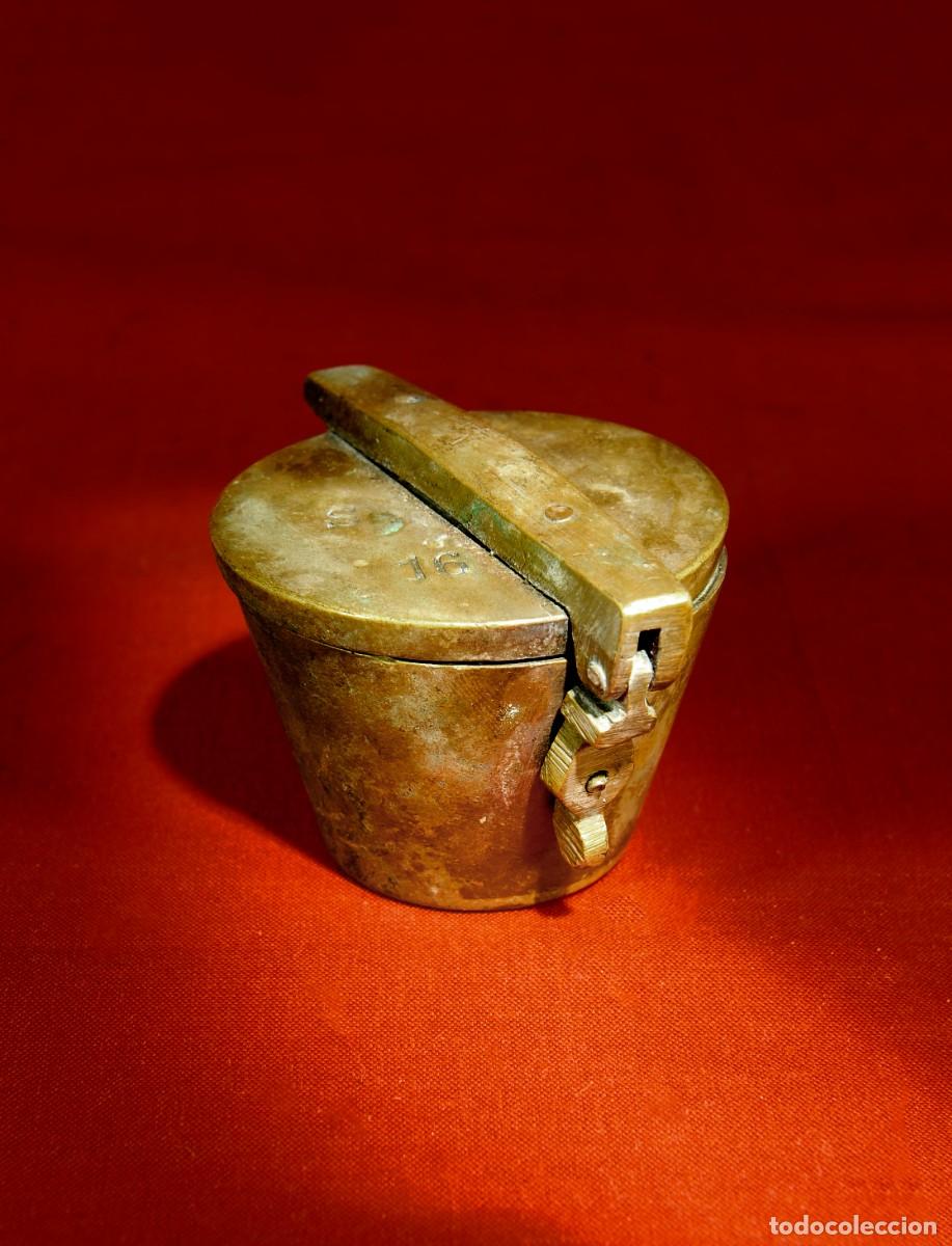 Antiquit&auml;ten: Antiguo ponderal de vasos anillados de Bronce de 4 cm de altura x 5 cm de di&aacute;metro y 400 g.