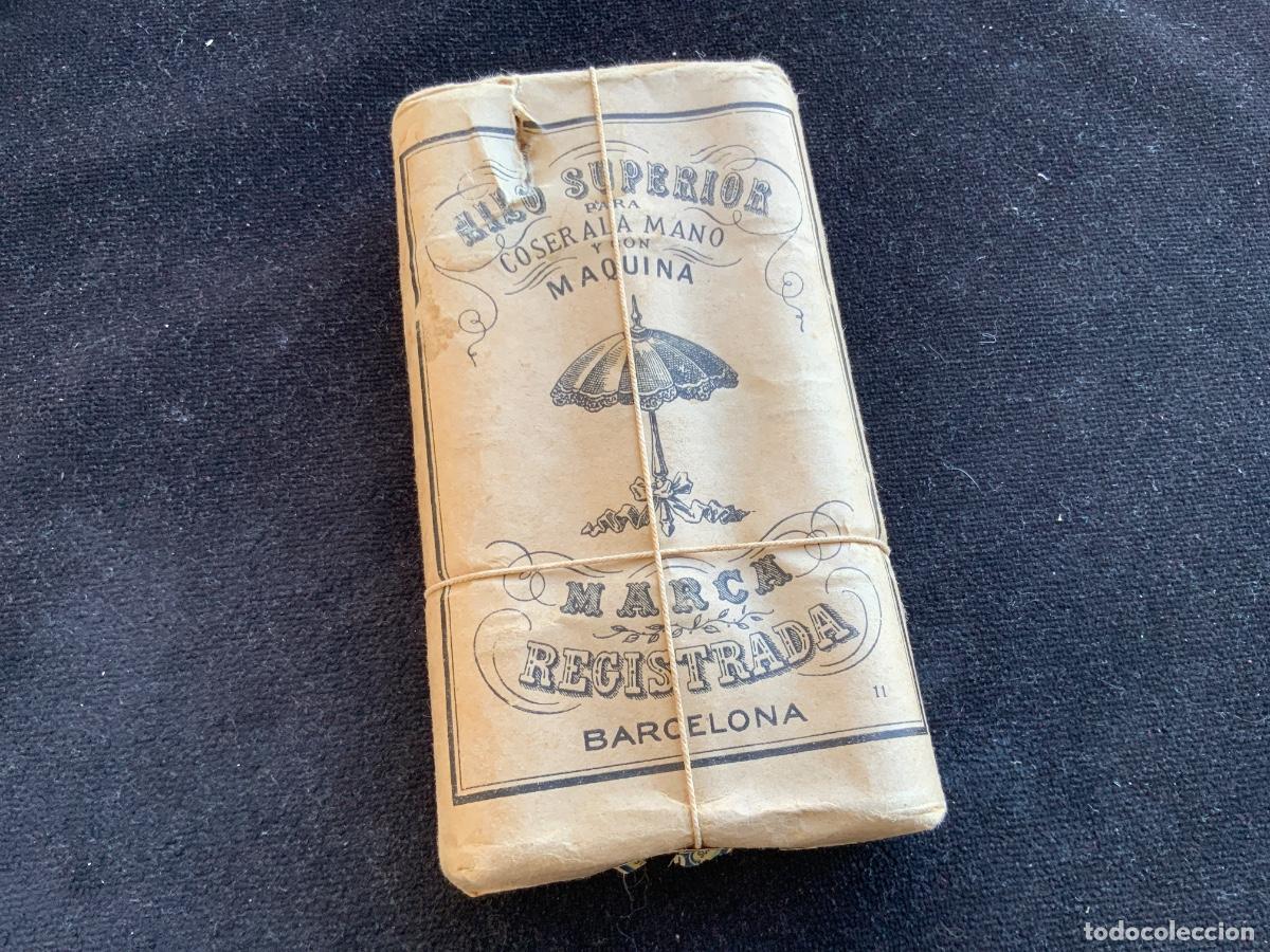 Antig&uuml;edades: Antiguo paquete de hilo superior coser a mano y maquina. Sombrilla, barcelona.