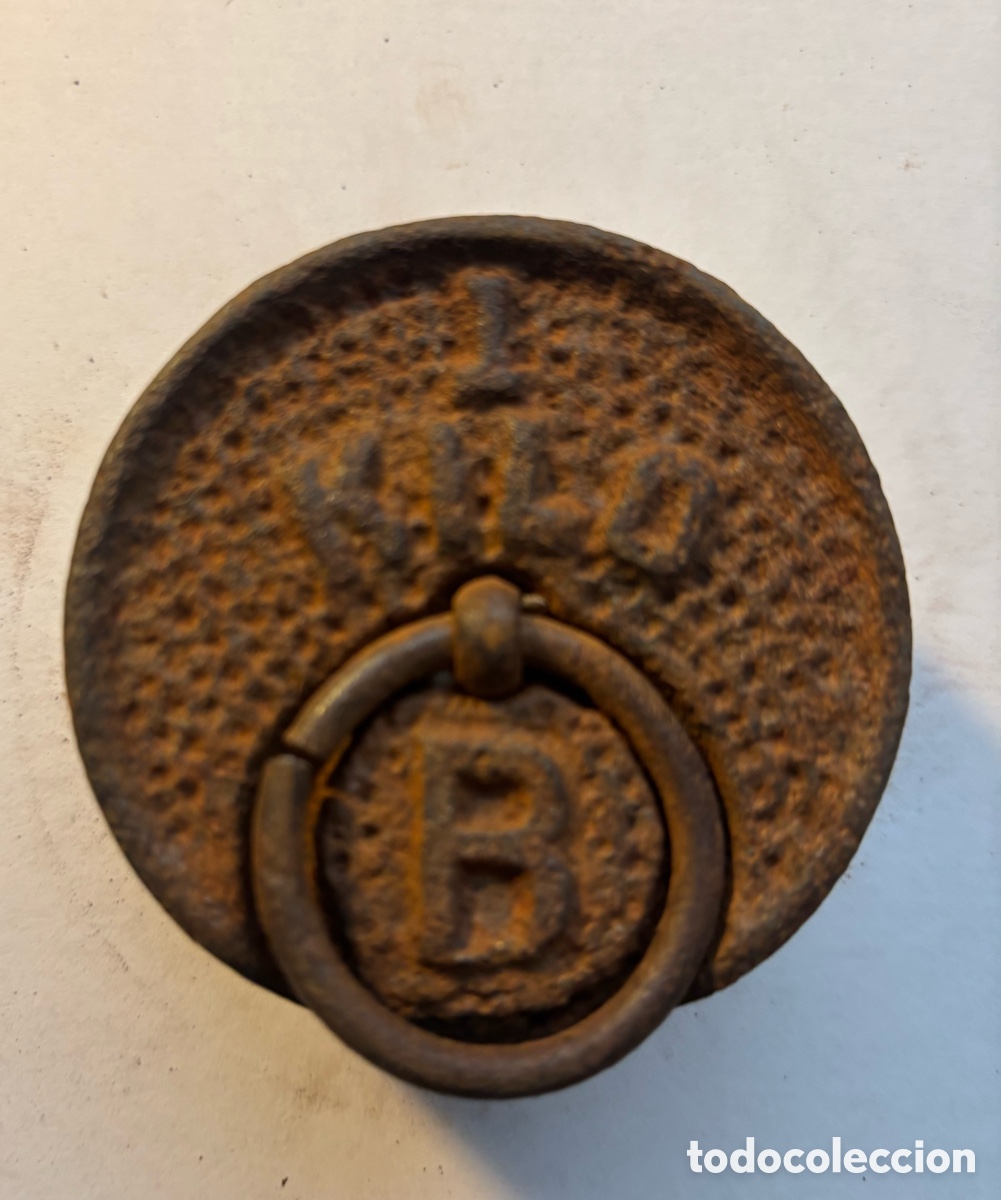 Antig&uuml;edades: Pesa de hierro antigua con asa 1 kg