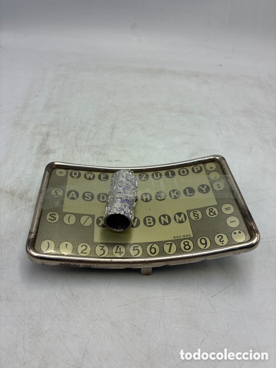 Antig&uuml;edades: Teclado y Cilindro de Mignon letra grande.
