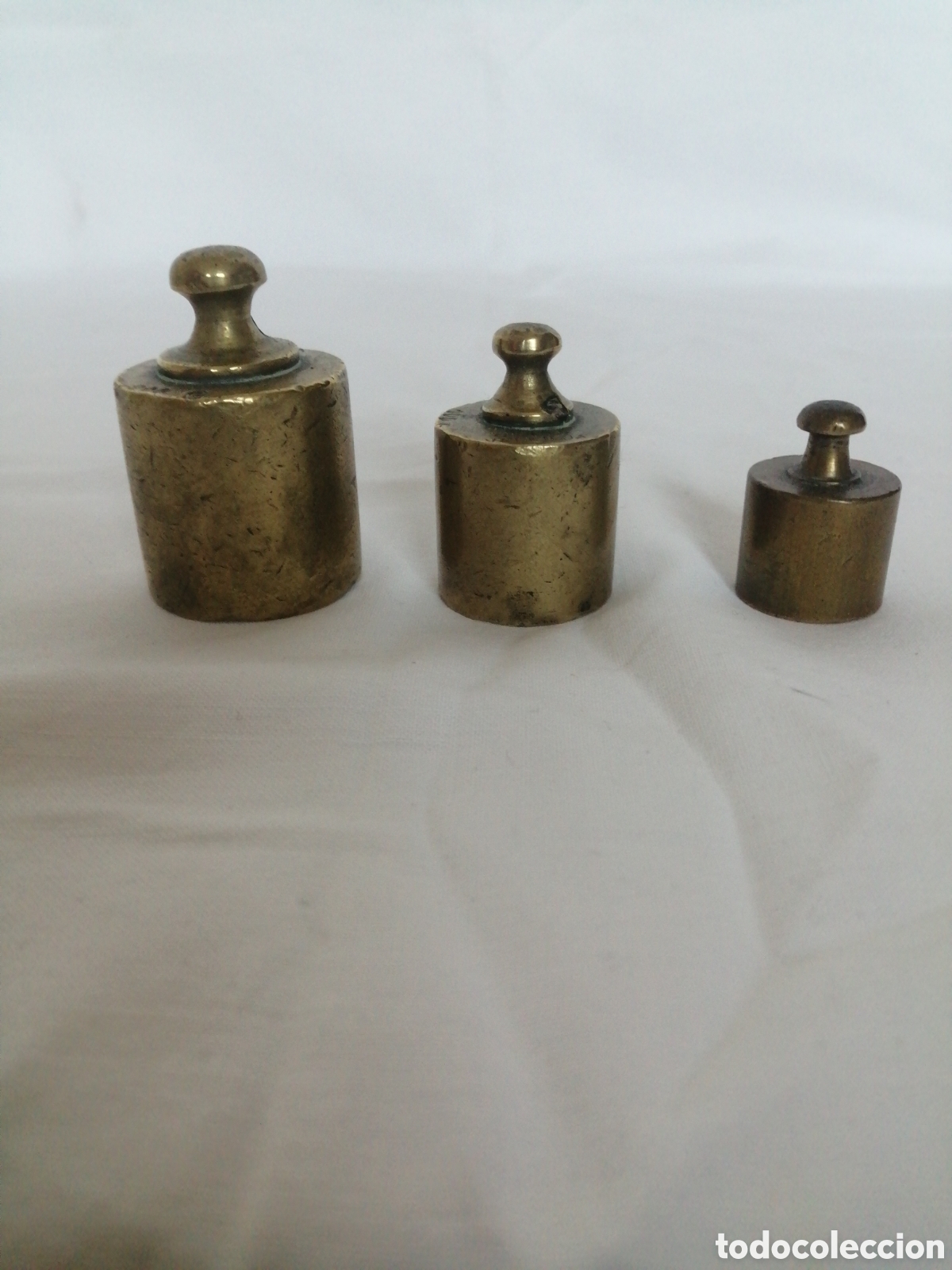 Antig&uuml;edades: Antiguas pesas de bronce.