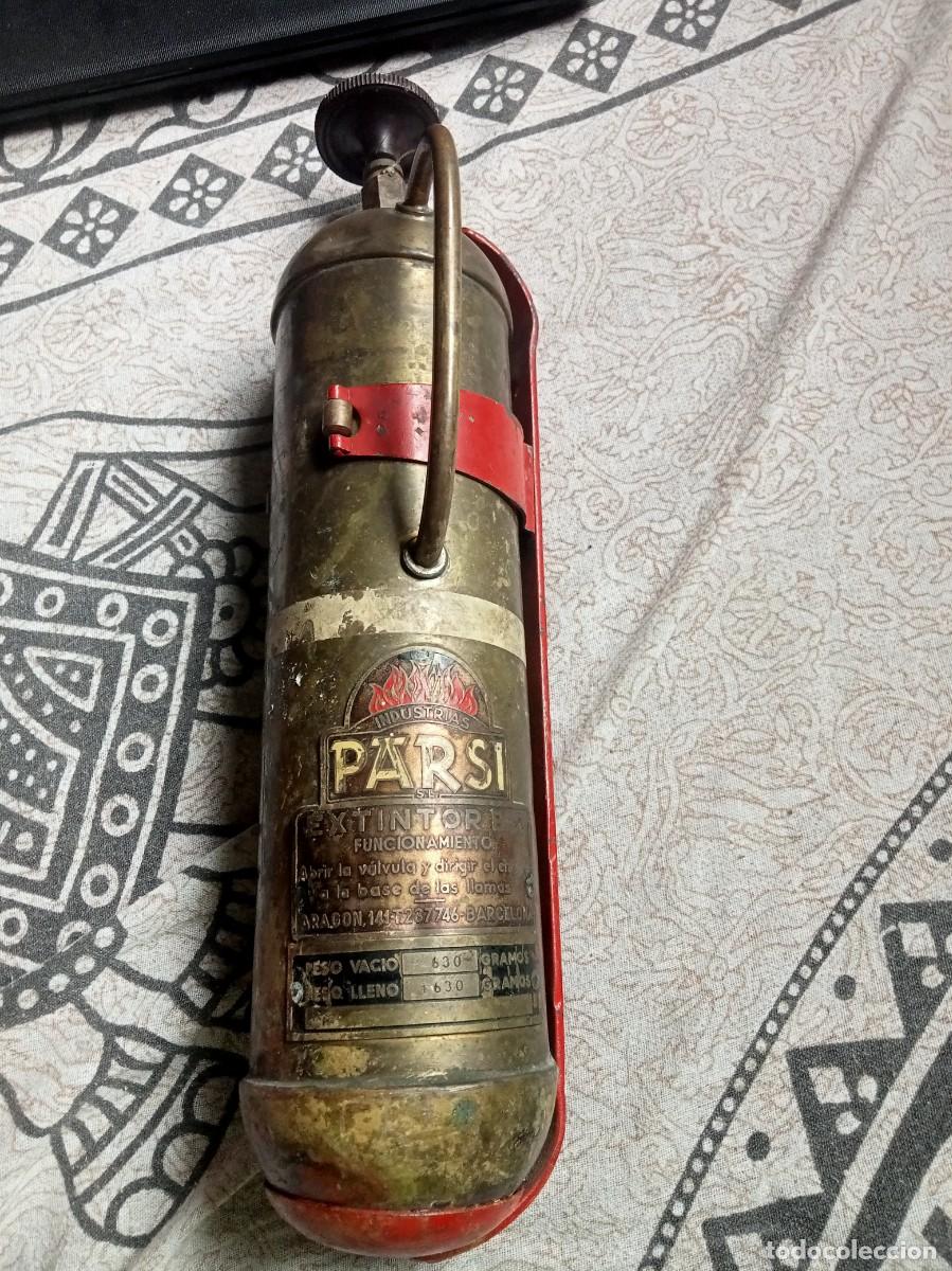 Antig&uuml;edades: EXTINTOR B2 PARSI COBRE O LAT&Oacute;N CON SOPORTE PARA COLGAR