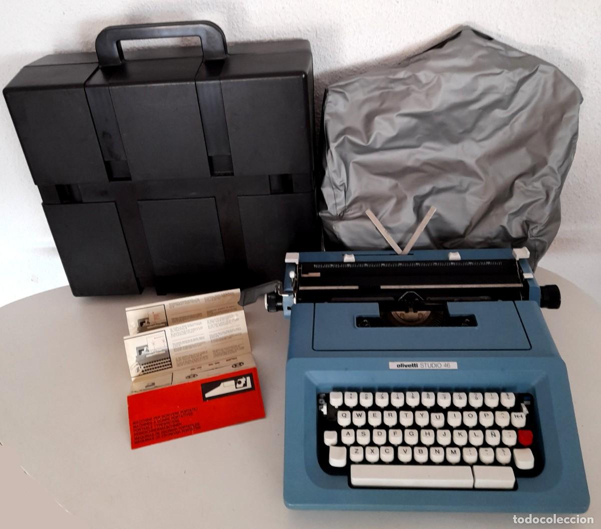 Antig&uuml;edades: M&aacute;quina de escribir Olivetti Studio 46 azul con funda instrucciones y malet&iacute;n funciona
