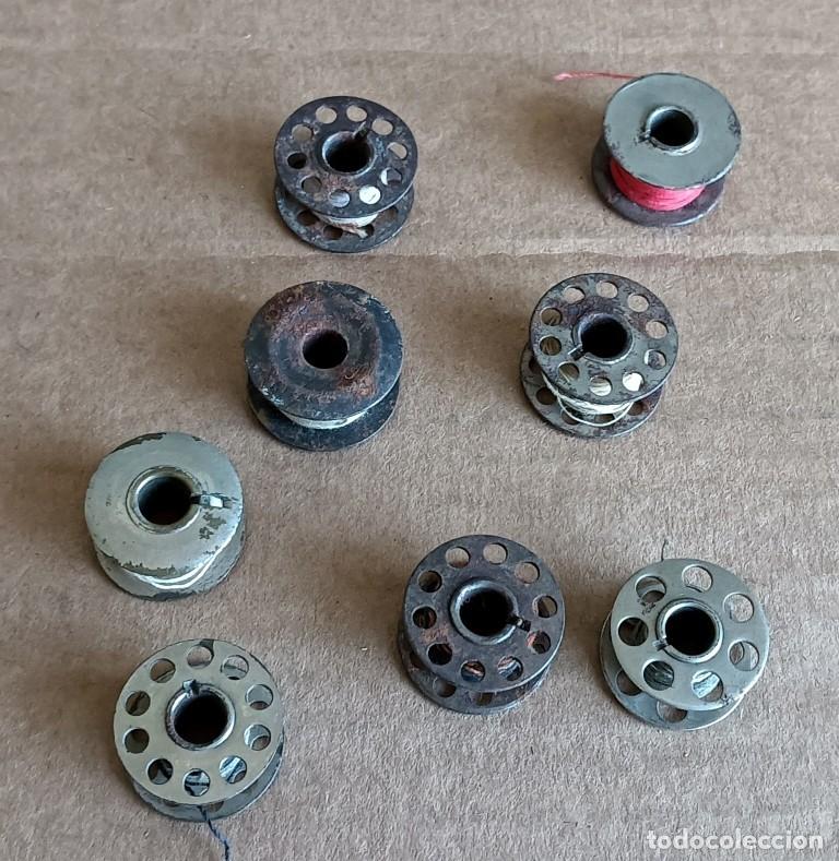 Antig&uuml;edades: 8 canillas de m&aacute;quina de coser