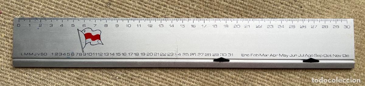 Antig&uuml;edades: Regla de aluminio con calendario. Publicidad Naviera Passat Cargoliner