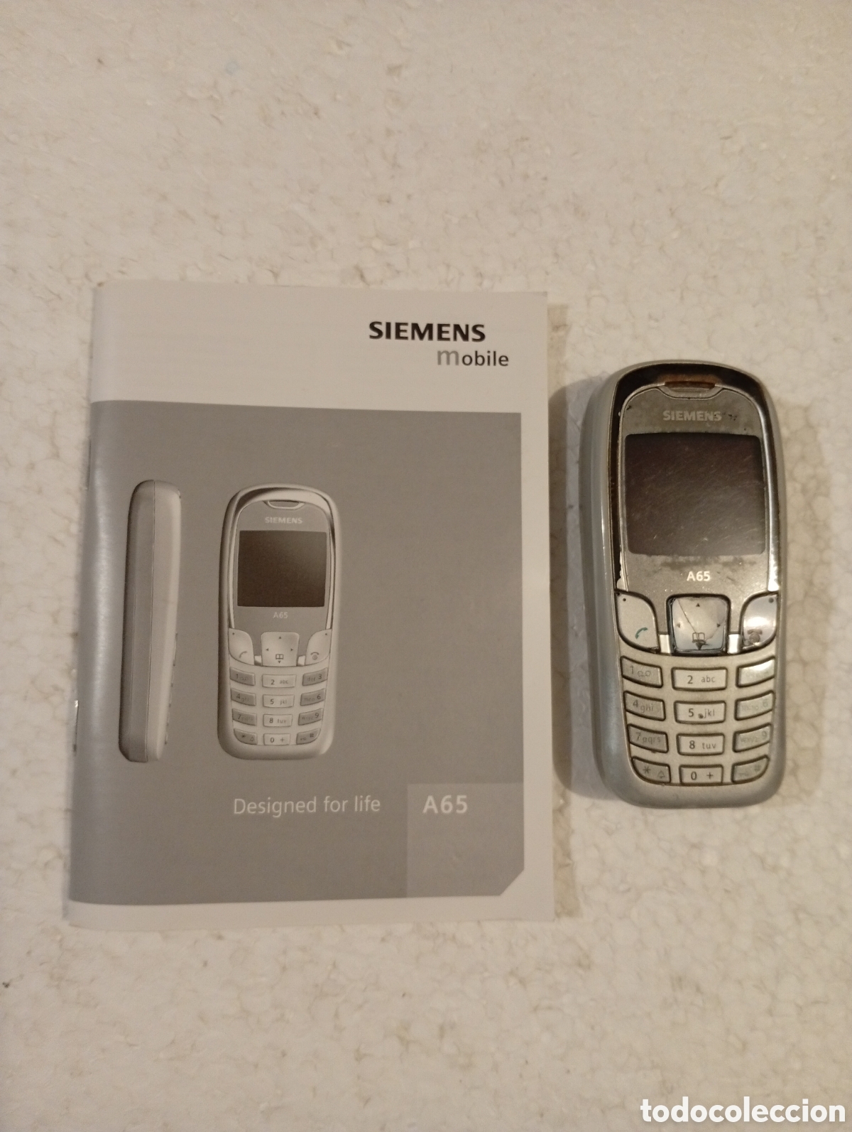 Tel&eacute;fonos: TEL&Eacute;FONO M&Oacute;VIL SIEMENS A65 + MANUAL DE INSTRUCCIONES