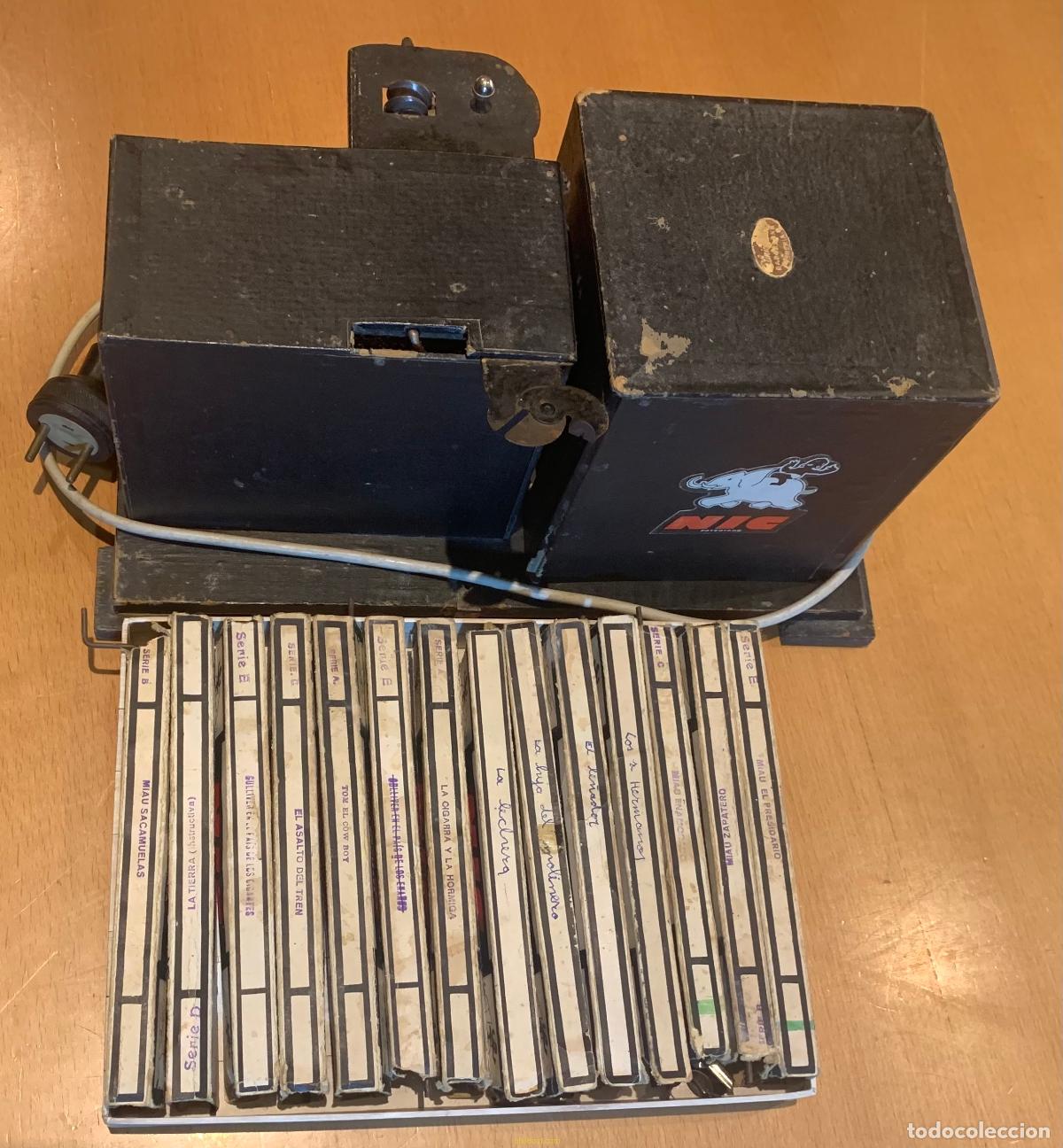 Antig&uuml;edades: PROYECTOR CINE NIC + 14 PELICULAS - Foto 2