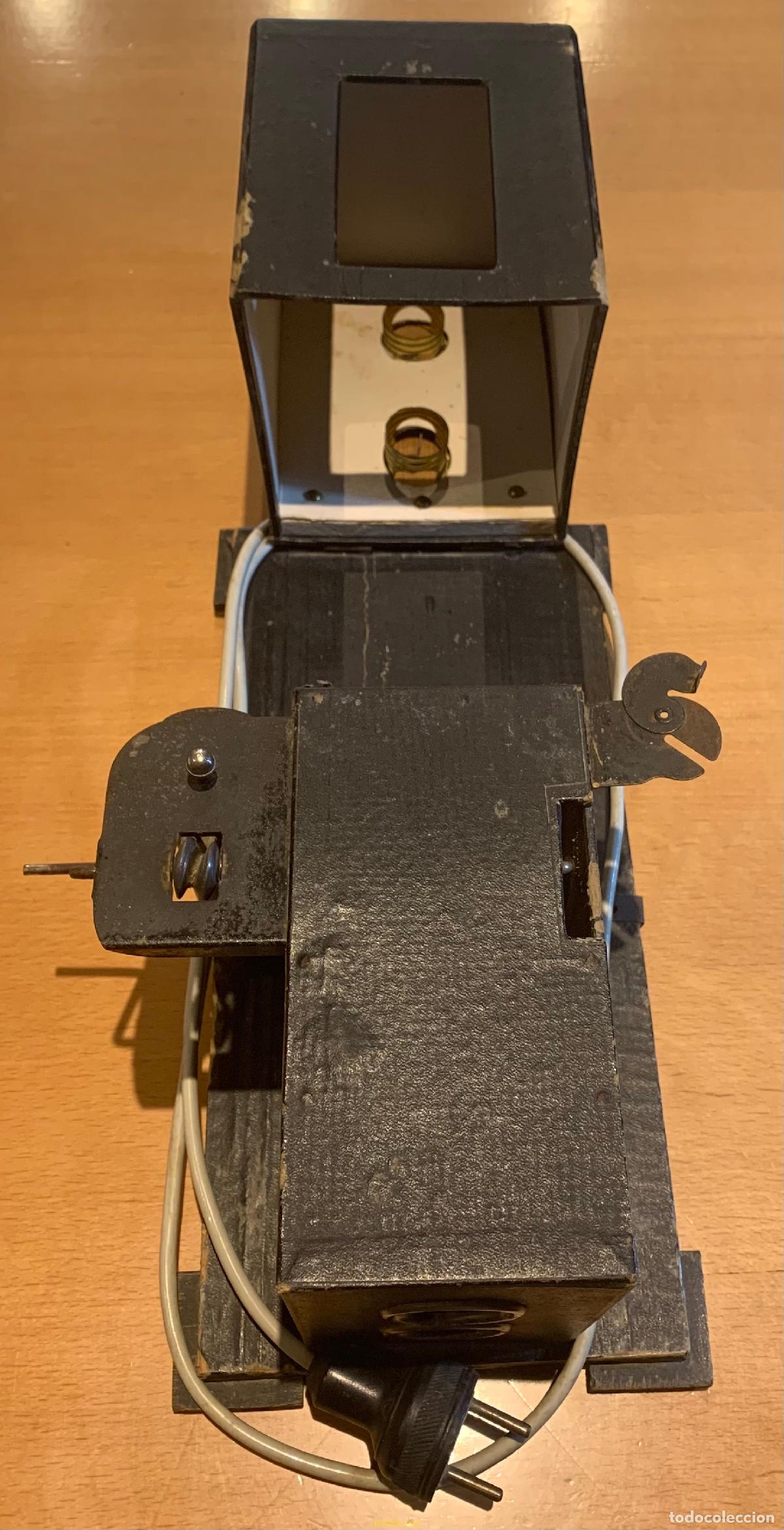 Antig&uuml;edades: PROYECTOR CINE NIC + 14 PELICULAS - Foto 5