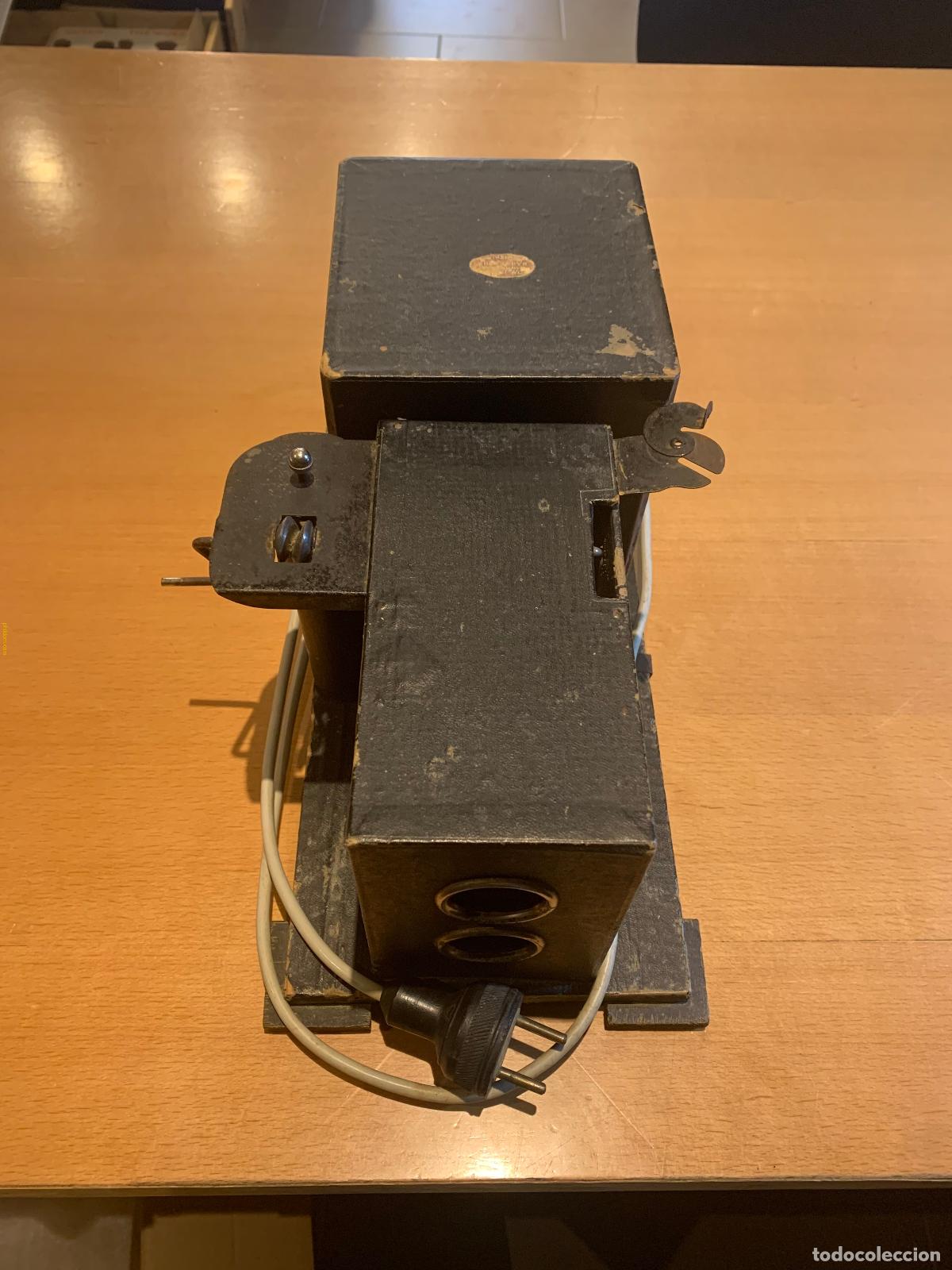 Antig&uuml;edades: PROYECTOR CINE NIC + 14 PELICULAS - Foto 6
