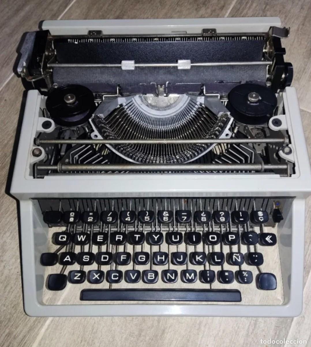 Antig&uuml;edades: Maquina de escribir Olivetti, funcional