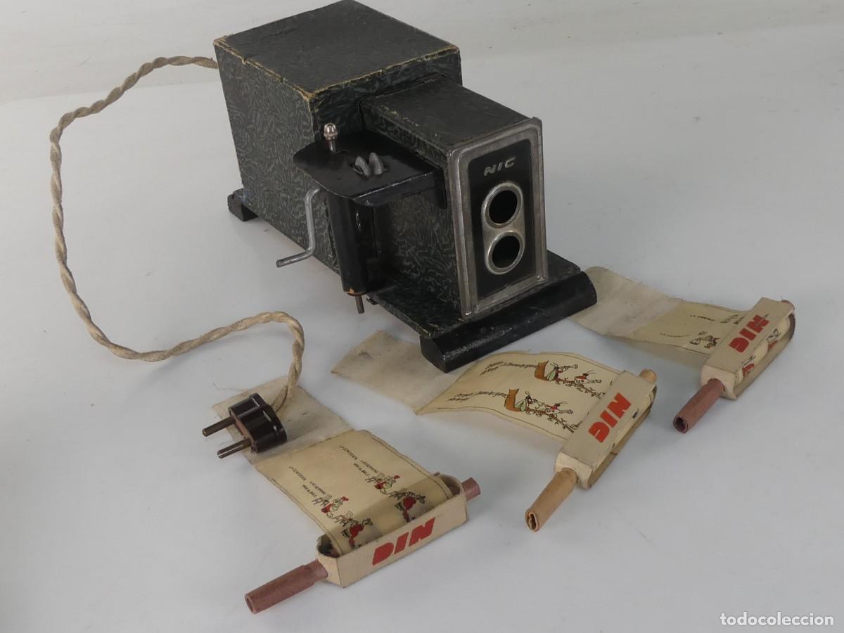 Antiquit&auml;ten: ANTIGUO PROYECTOR DE CINE SONORO MARCA NIC CON PELICULAS