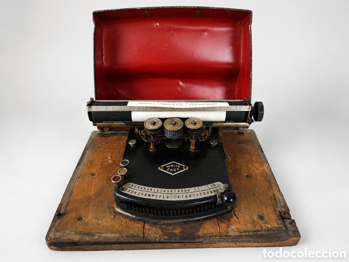 Antig&uuml;edades: Rara m&aacute;quina de escribir indexada &ldquo;Write Easy&rdquo; con base de madera y cubierta original