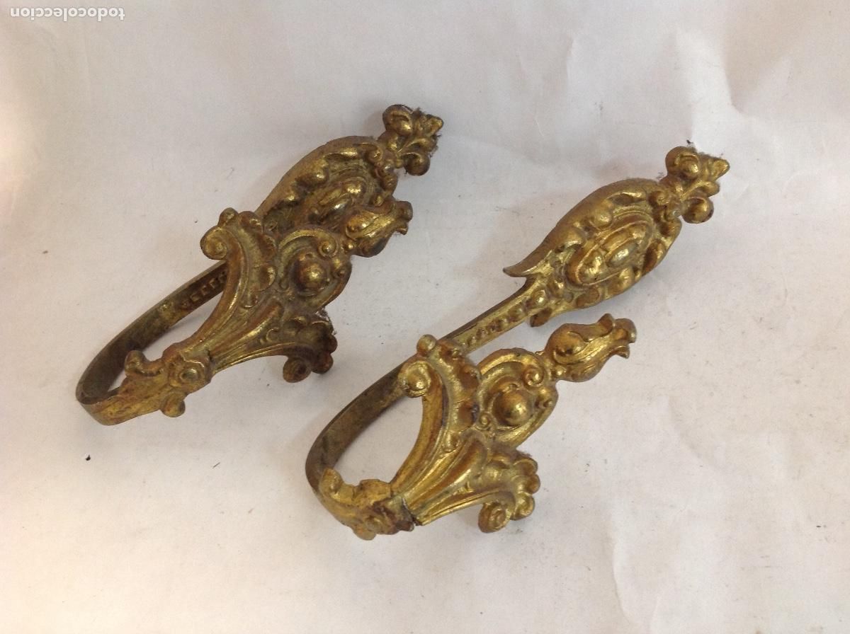 Antig&uuml;edades: Pareja de alzapa&ntilde;os de bronce. s XIX