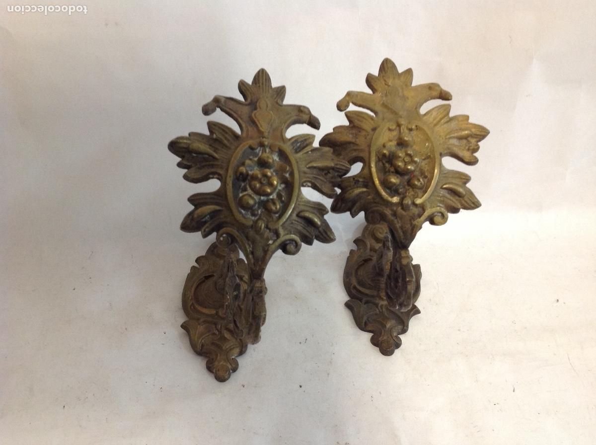 Antig&uuml;edades: Pareja de alzapa&ntilde;os de bronce. s XIX