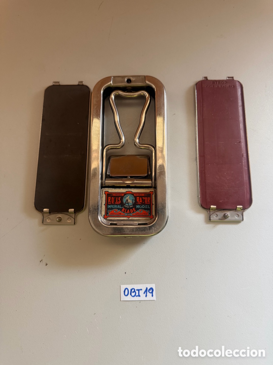 Antig&uuml;edades: maquinilla de afeitar vintage de la marca Rolls Razor fabricada en Inglaterra.