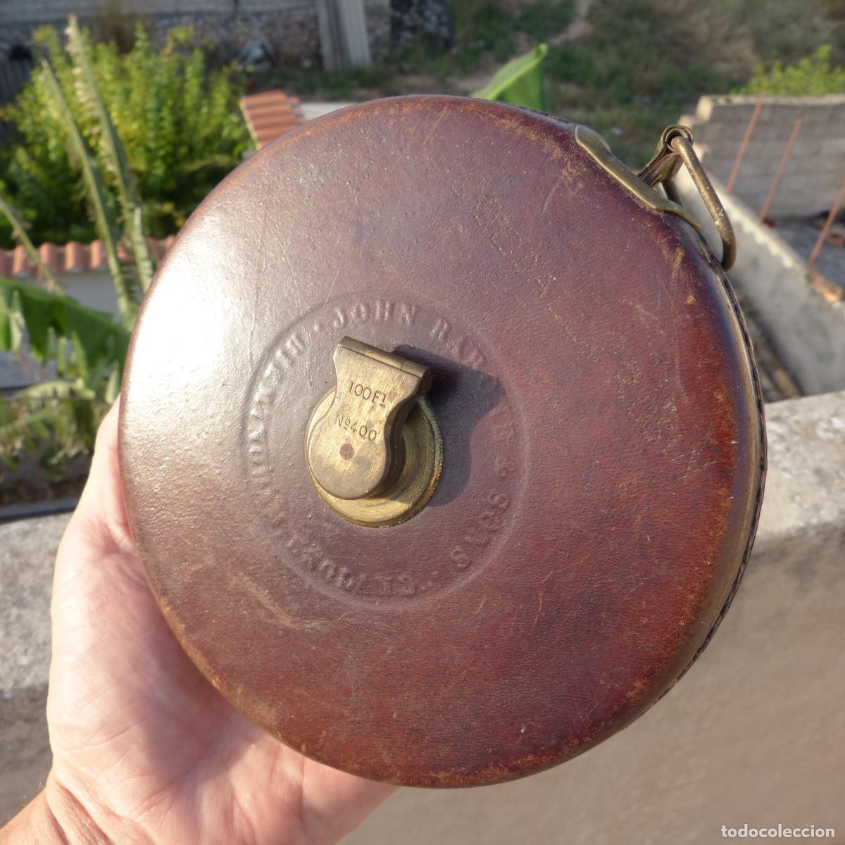 Antig&uuml;edades: Antigua cinta metrica John Rabone and sons, Birmingham, england. 576gr, 15cm, 100 feet, n400.