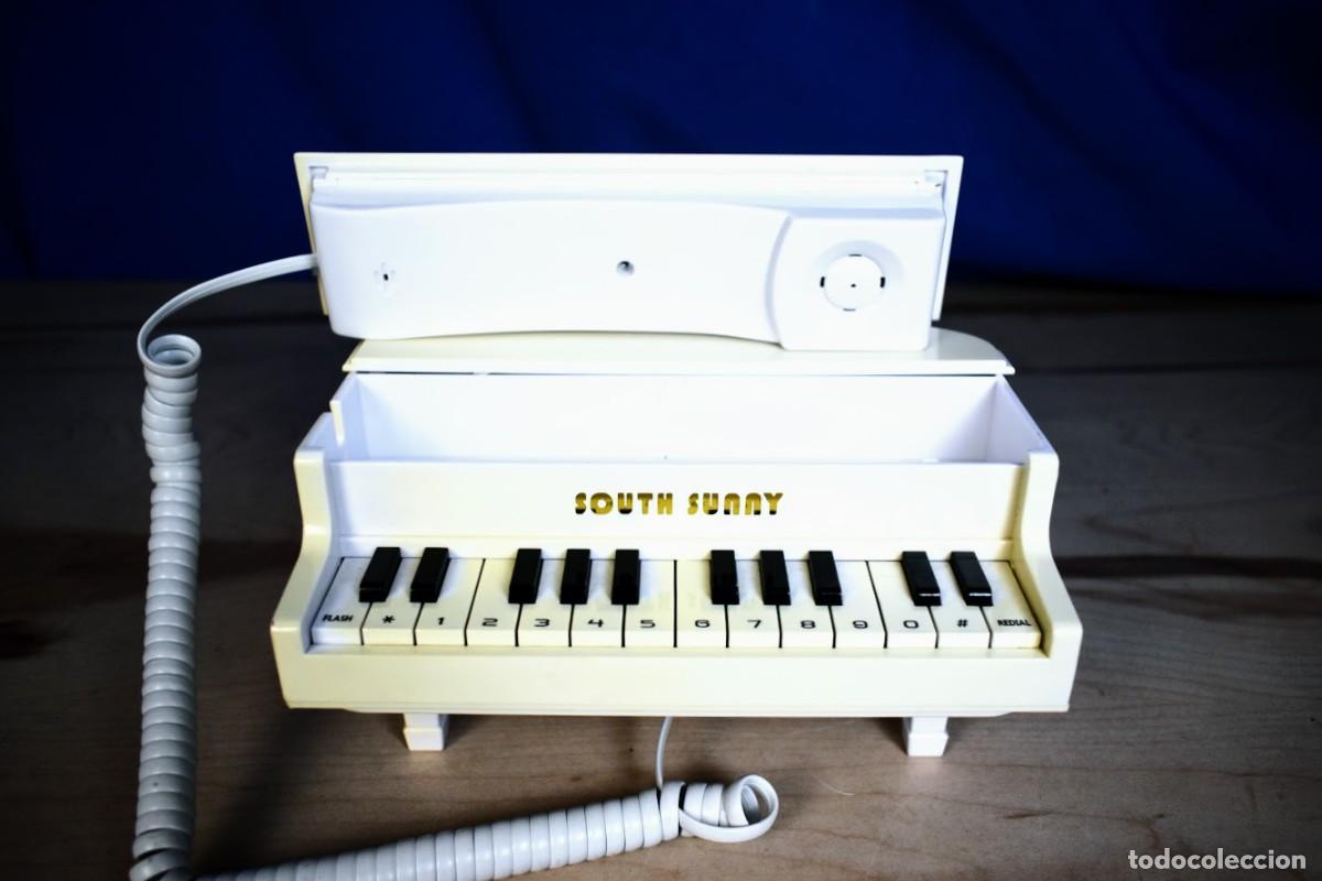 Tel&eacute;fonos: Tel&eacute;fono vintage con forma de piano South sunny a&ntilde;os 80