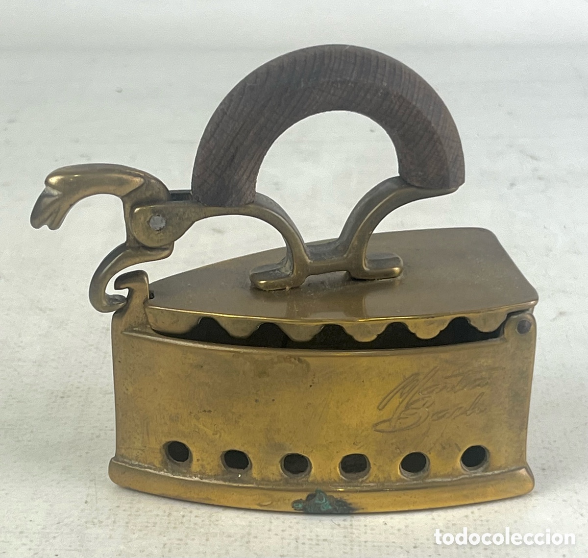 Antig&uuml;edades: PLANCHA DE BRONCE Y MANGO MADERA