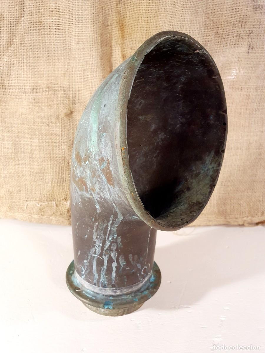 Antig&uuml;edades: Manguerote de bronce antiguo.