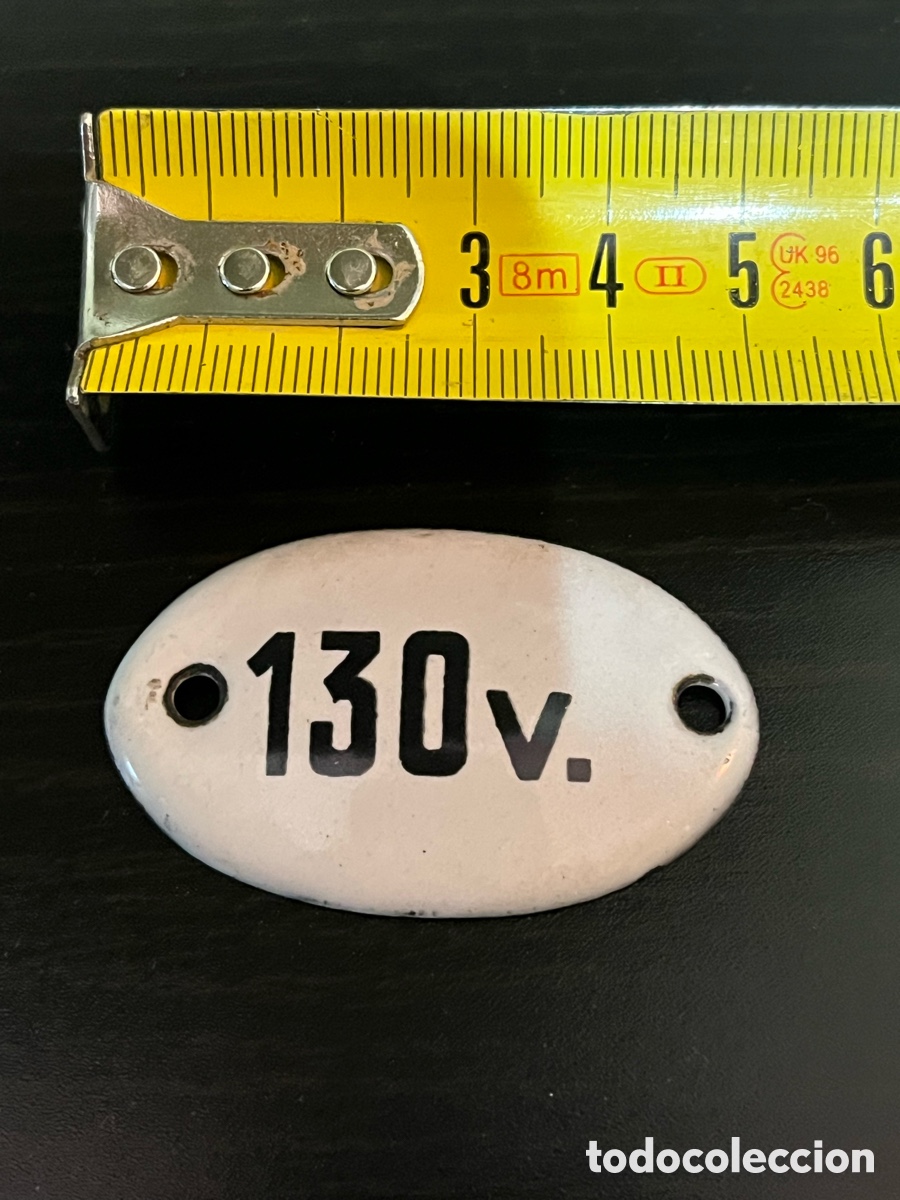 Antig&uuml;edades: Antigua chapa o placa esmaltada 130v .