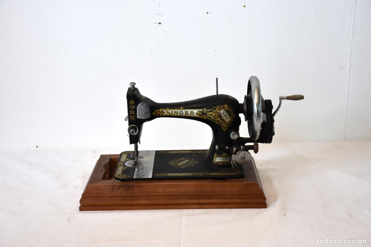 Antig&uuml;edades: Antigua maquina de coser Singer de manivela