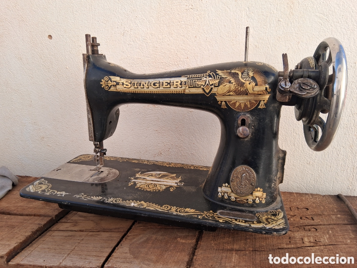 Antig&uuml;edades: Maquina antigua de coser singer
