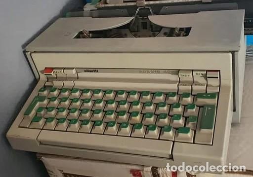 Antig&uuml;edades: M&aacute;quina de Escribir El&eacute;ctrica Olivetti Praxis 48 - Vintage 1964