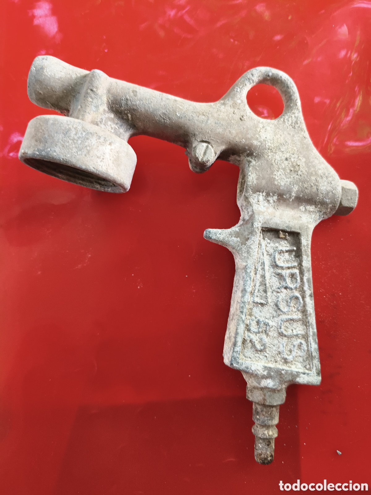 Antig&uuml;edades: Antiguo grifo ,pistola u otra herramienta parece de plomo marcado Urcus 52