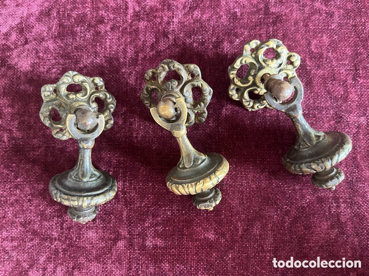 Antig&uuml;edades: Tiradores de p&eacute;ndulo de bronce.