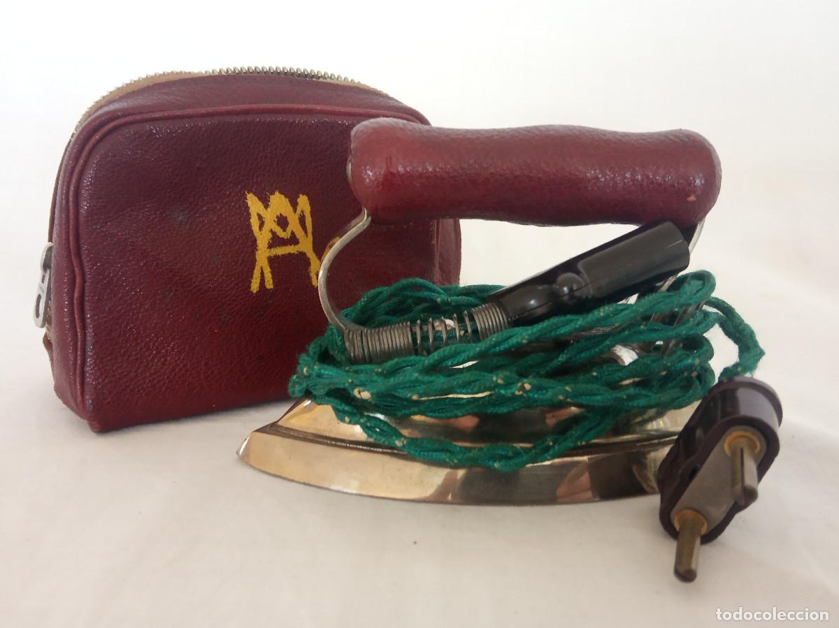 Antig&uuml;edades: Plancha de viaje marca Fuego con funda a juego