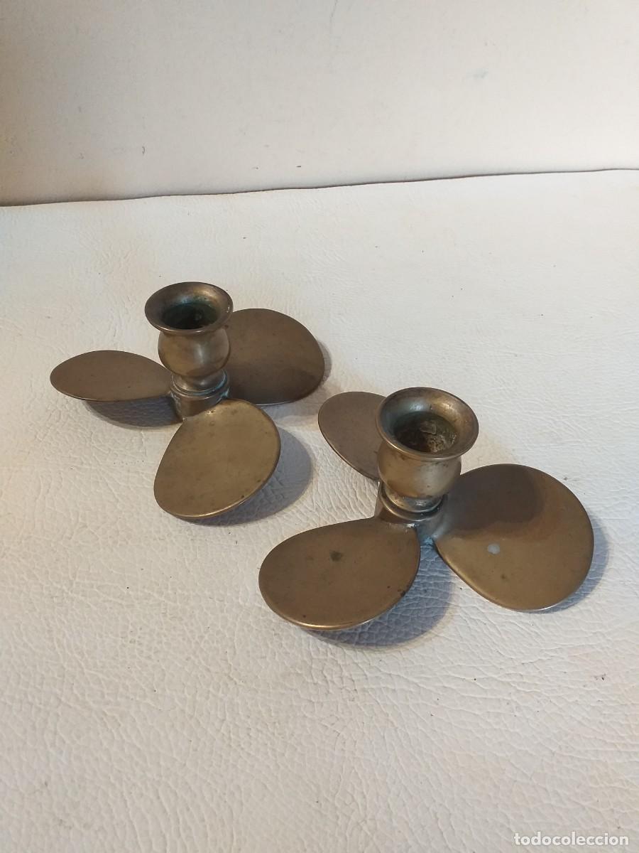 Antiquit&auml;ten: Pareja de porta velas con froma de h&eacute;lices de barco en bronce